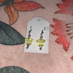 Yellow Star Earrings with Purple Accents